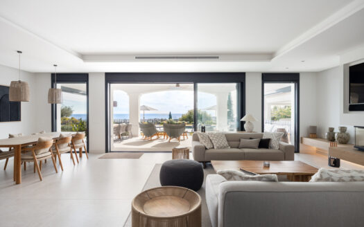 Set within the prestigious 24-hour gated community, moments from the iconic Anantara Villa Padierna Palace, this exceptional south-facing villa embodies the very best of contemporary Mediterranean luxury. Recently completed after a total high-end renovation, the residence seamlessly combines refined Andalusian architecture with cutting-edge technology and impeccable craftsmanship.
Occupying an elevated position, the villa enjoys breathtaking, uninterrupted panoramic views of the sea from every level, while its southern orientation ensures abundant natural light throughout the day. The property offers four expansive en-suite bedrooms and seven designer bathrooms, each guest suite enjoying complete privacy and luxurious finishes. Comfort is paramount, with water-based underfloor heating throughout, complemented by an advanced Airzone climate system and full smart home integration.
Designed as a private wellness and entertainment retreat, the villa features a fully equipped gym, a bespoke massage and spa room, and a versatile bar, cinema and playroom—ideal for both relaxation and social gatherings. The exterior is equally impressive. Beautifully landscaped gardens frame a heated infinity-style pool, sleek sun decks, and elegant chill-out areas, including a fire pit and chiminea. An exceptional outdoor kitchen with a premium Napoleon grill sets the scene for unforgettable al-fresco dining against a stunning sea backdrop.
Additional features include:
– Mobalco designer kitchen with Gaggenau appliances
– High-quality Roman carpentry and Cortizo aluminium windows
– Electric blinds and insect screens throughout
– Italian Natuzzi sofas and Dedon outdoor furniture
– LG televisions in every room
– Water descaling system
– Verisure alarm system
– Integrated garage for two vehicles with electric car charger
This is a rare opportunity to acquire a turnkey luxury villa in one of Benahavís’ most sought-after gated communities—offering privacy, security, world-class finishes, and an unrivalled coastal lifestyle.